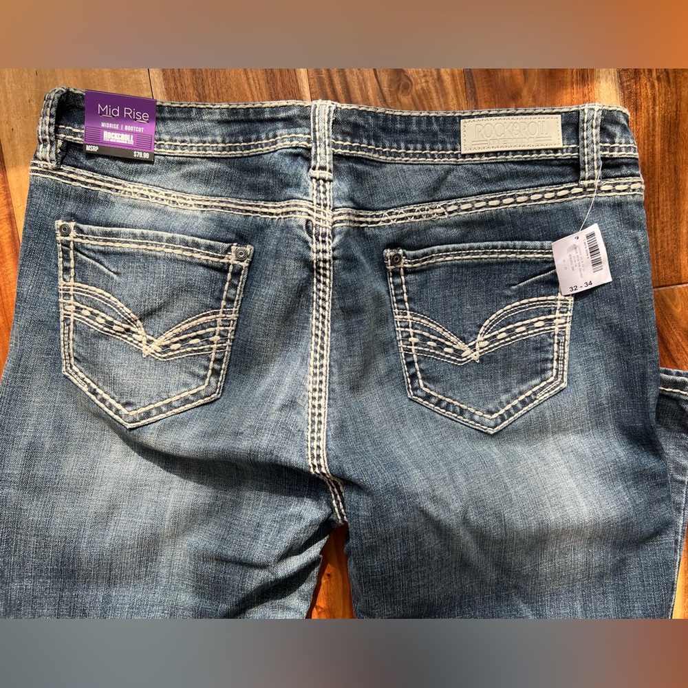 Rock & Roll Cowgirl bootcut jeans medium wash with tags. NWT
